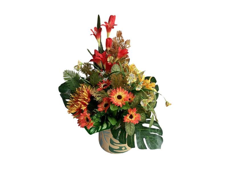 Orange, yellow and red artificial flower table decoration for hire in Auckland area