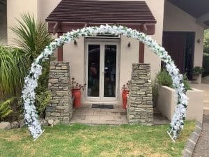 Blossom decorated wedding arch for hire Auckland wide