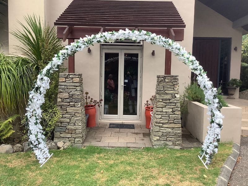 Blossom decorated wedding arch for hire Auckland wide